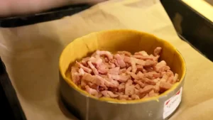 garnir avec les lardons